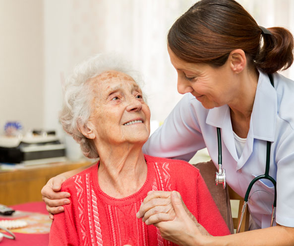 Nurse helping patient.