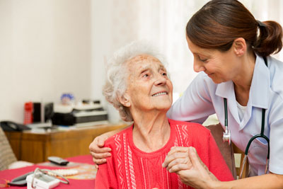 Nurse helping patient